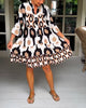 Dafne™ – Verspieltes Printkleid mit Schwung & 3/4-Ärmeln